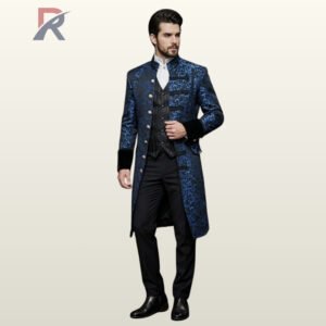 Full front view of a male model wearing a royal sapphire blue jacquard damask gothic frock coat with silver dome buttons and black velvet cuffs.