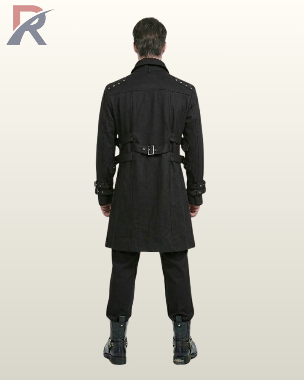 Full rear model view of a men's black gothic trench coat showcasing a center back buckle belt, side waist straps, and studded shoulder epaulets.