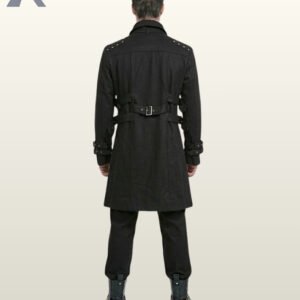 Full rear model view of a men's black gothic trench coat showcasing a center back buckle belt, side waist straps, and studded shoulder epaulets.