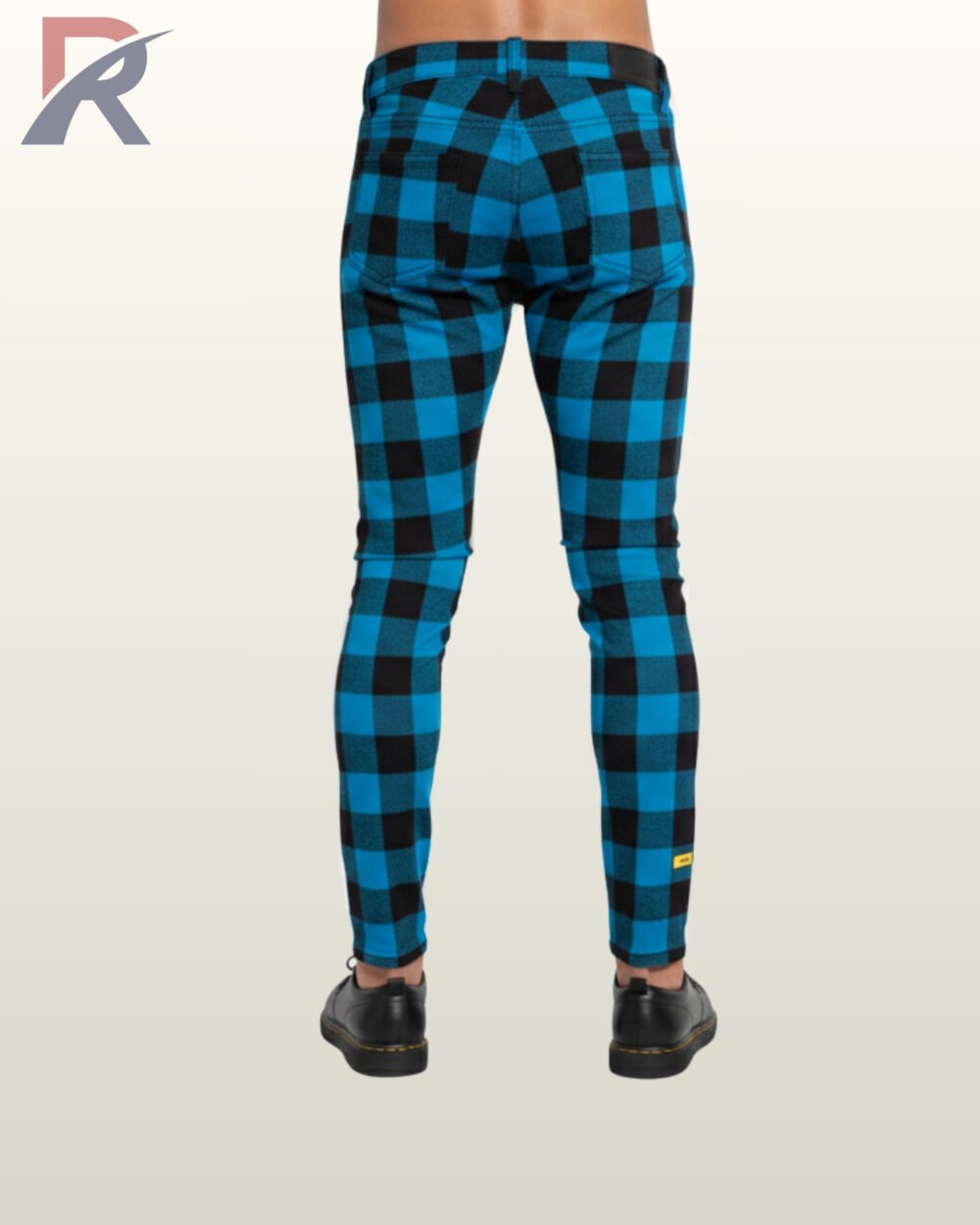 Vibrant turquoise and black buffalo plaid men's trousers with a close skinny fit.