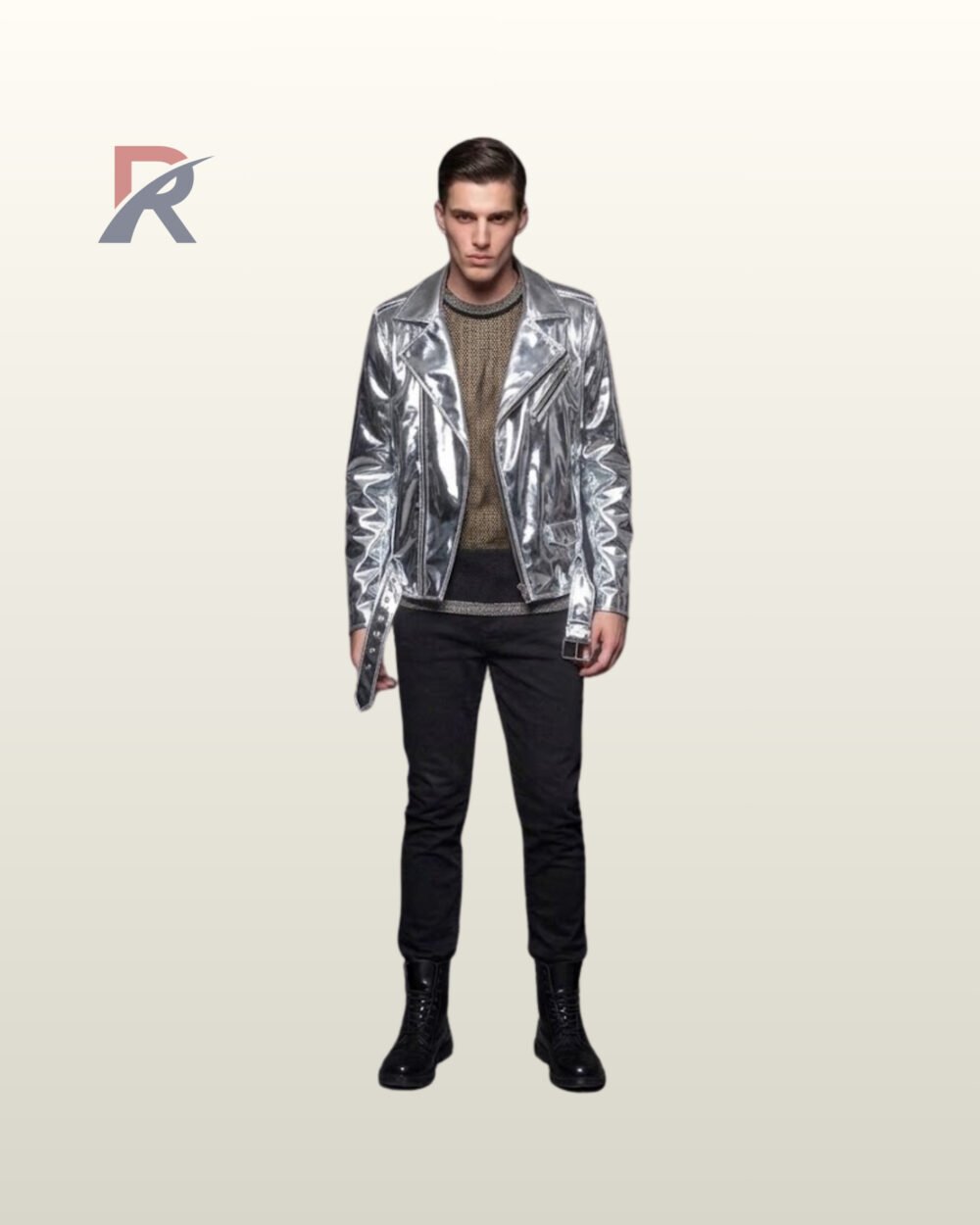 Full front view of a male model wearing an asymmetrical metallic silver patent leather motorcycle jacket over a mesh top with black slim-fit trousers.