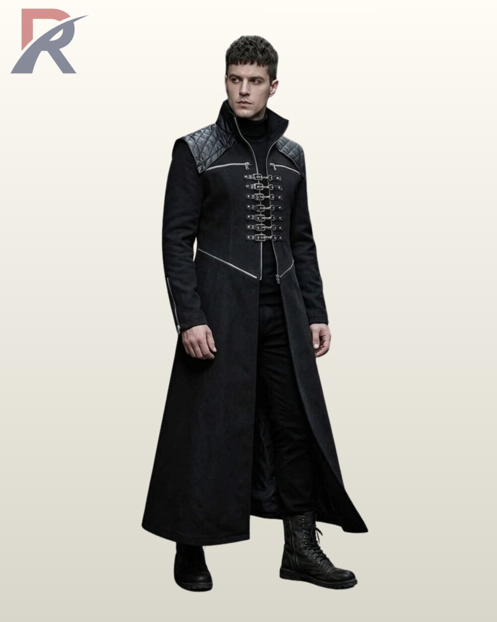 Three-quarter model view of a men's black gothic trench coat with diamond-quilted shoulders, silver D-ring chest clasps, and zipped sleeve cuffs.
