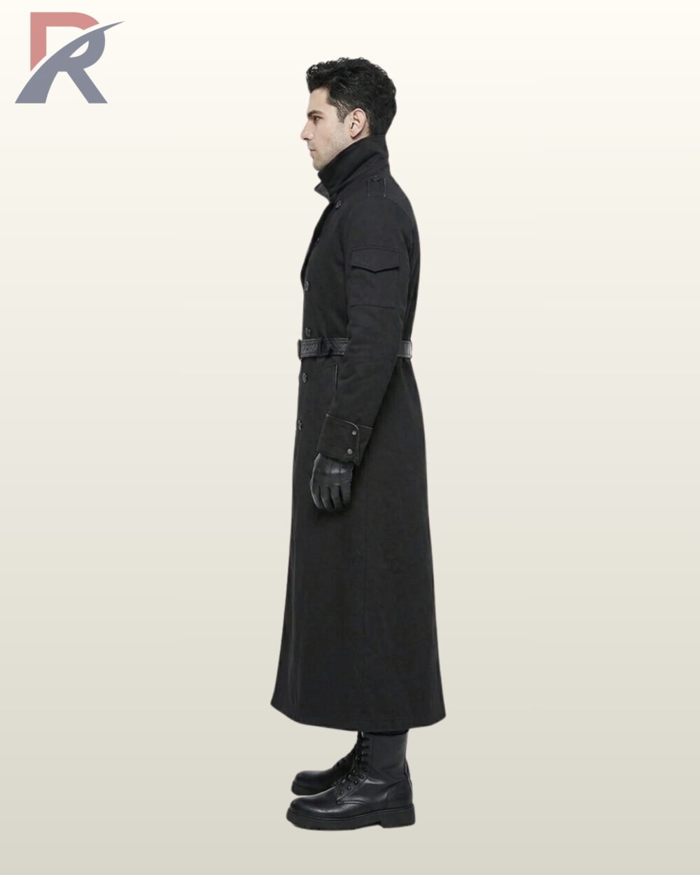 Side profile view of a model wearing a long black gothic trench coat highlighting a flap sleeve pocket, folded cuff bands, and standing collar.