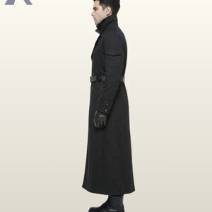 Side profile view of a model wearing a long black gothic trench coat highlighting a flap sleeve pocket, folded cuff bands, and standing collar.