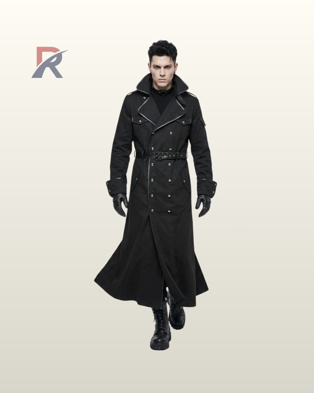 Full front walking view of a male model wearing an ankle-length black gothic trench coat with double-breasted silver buttons, waist belt, and leather gloves.