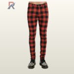 Full front view of a male model wearing men's red and black buffalo plaid skinny punk pants with classic five-pocket styling and zip fly.