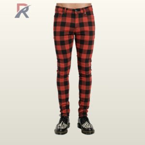 Full front view of a male model wearing men's red and black buffalo plaid skinny punk pants with classic five-pocket styling and zip fly.