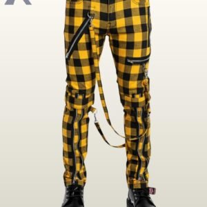 Men's yellow checkered gothic bondage trousers featuring thigh buckle bands, hanging D-ring straps, and black leather combat boots.