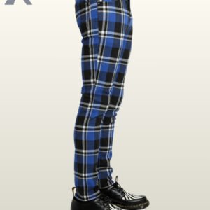 Side profile view of a model wearing men's cobalt blue, black, and white tartan plaid skinny punk trousers showing side seam pattern alignment.
