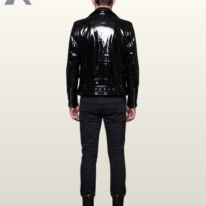 Full rear view of a model wearing a glossy black patent leather motorcycle jacket highlighting a high-shine finish, back shoulder panels, and a buckled waist.