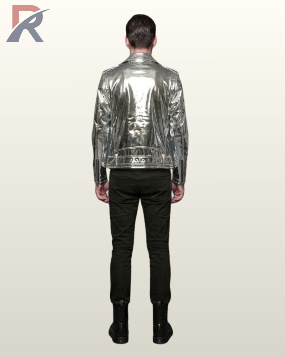 Back perspective of a men's futuristic chrome silver biker jacket displaying reflective finish, zippered cuffs, and black jeans with leather boots.