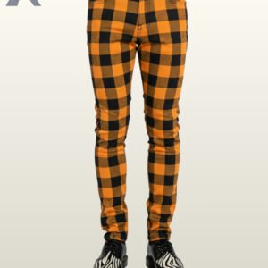Front view of punk style orange and black checkered trousers on a model.