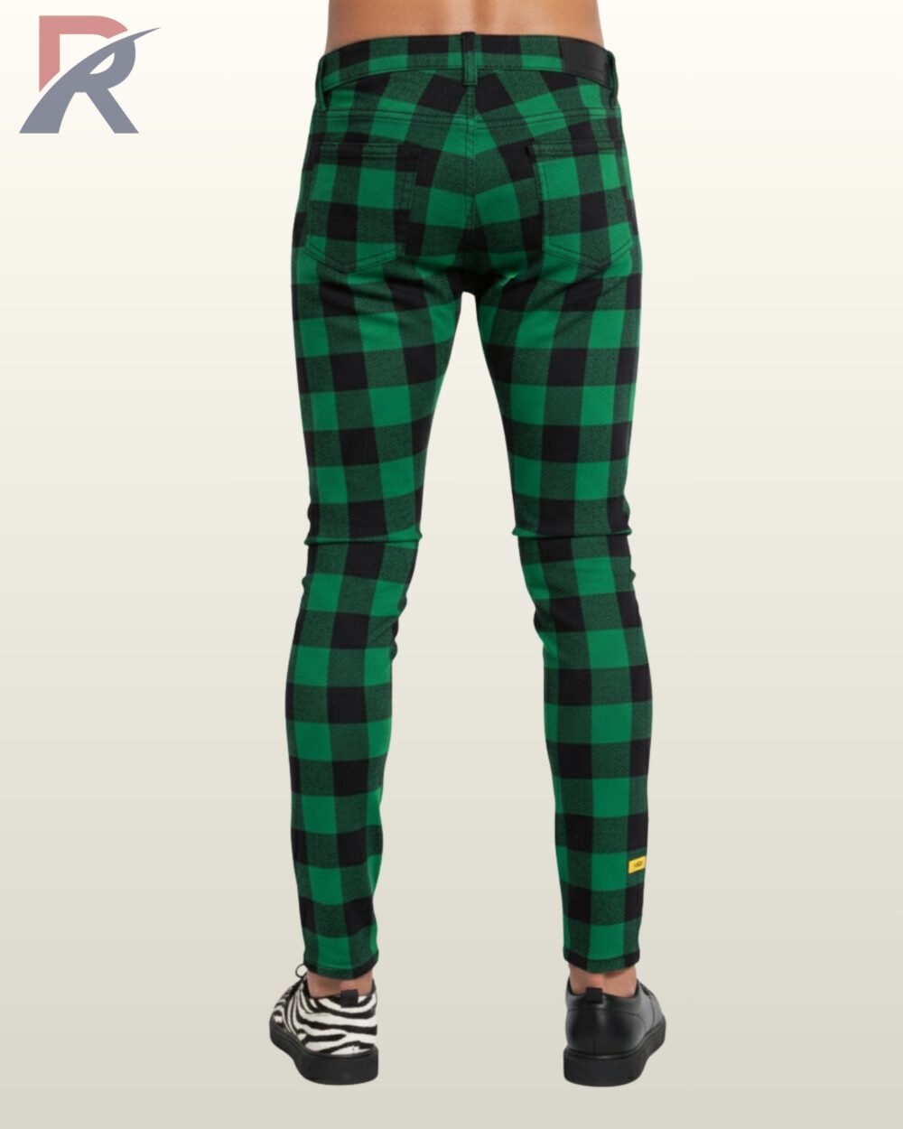 Alternative fashion green plaid trousers paired with black zebra-striped shoes.