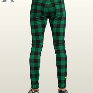 Alternative fashion green plaid trousers paired with black zebra-striped shoes.