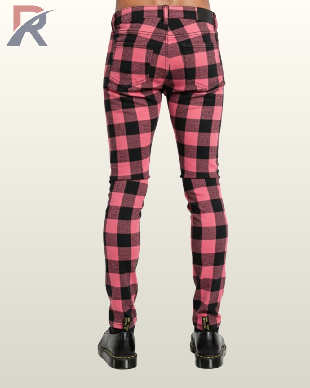 Gothic street fashion pink and black plaid skinny jeans paired with zebra print shoes.
