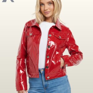 Front view of a women's shiny red vinyl cropped jacket paired with blue jeans.