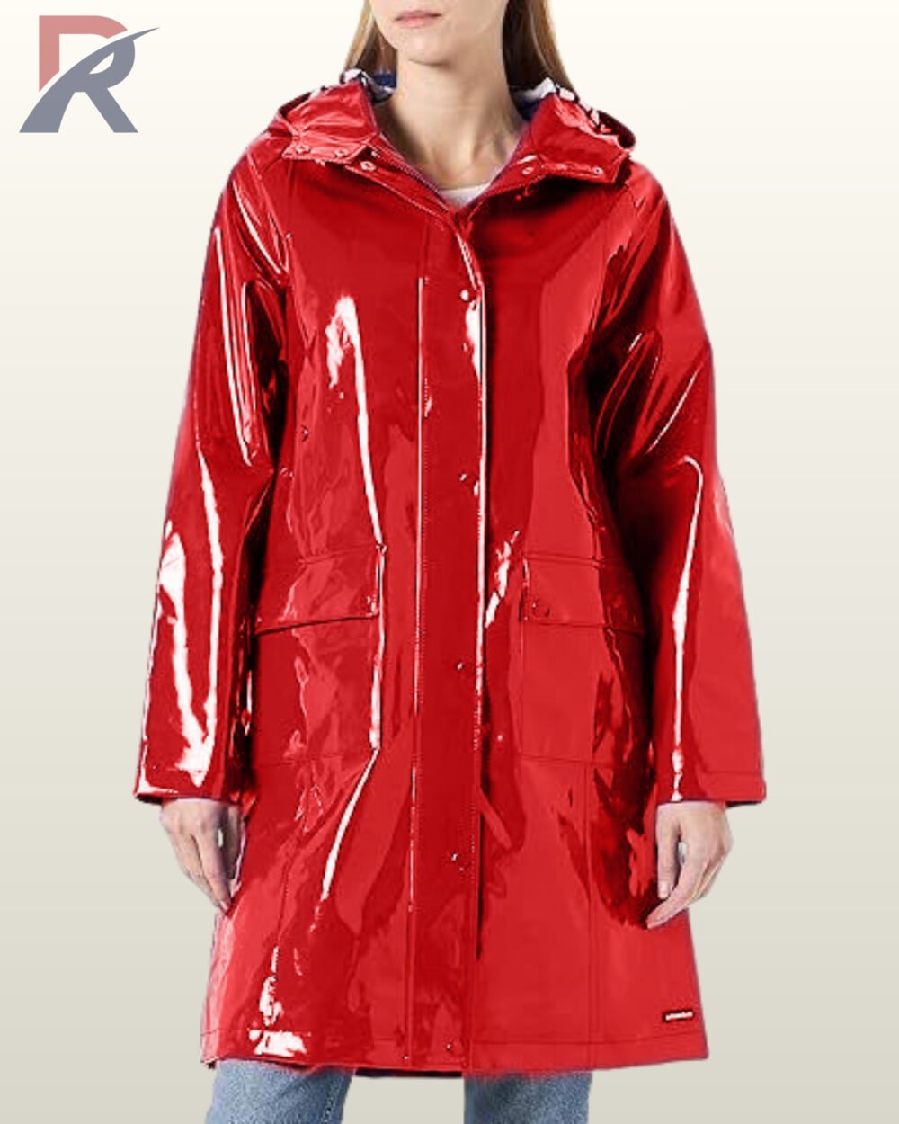 A woman wearing a vibrant, high-gloss red vinyl raincoat featuring an attached hood.