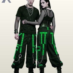 Baggy alternative style black cargo pants styled with electric green contrast straps.