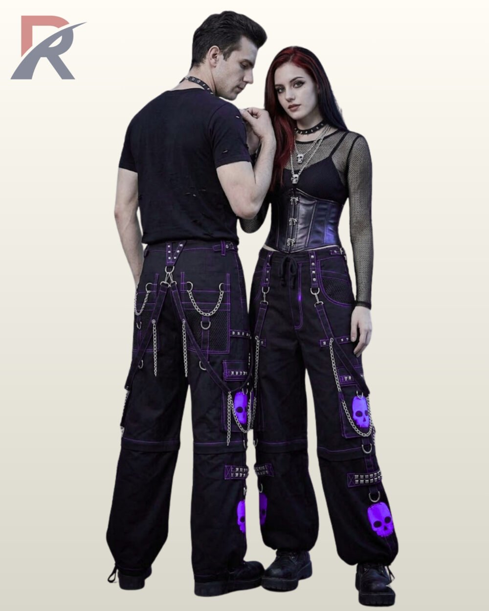 Couple displaying unisex alternative streetwear pants styled with purple skull accents, straps, and wide legs.