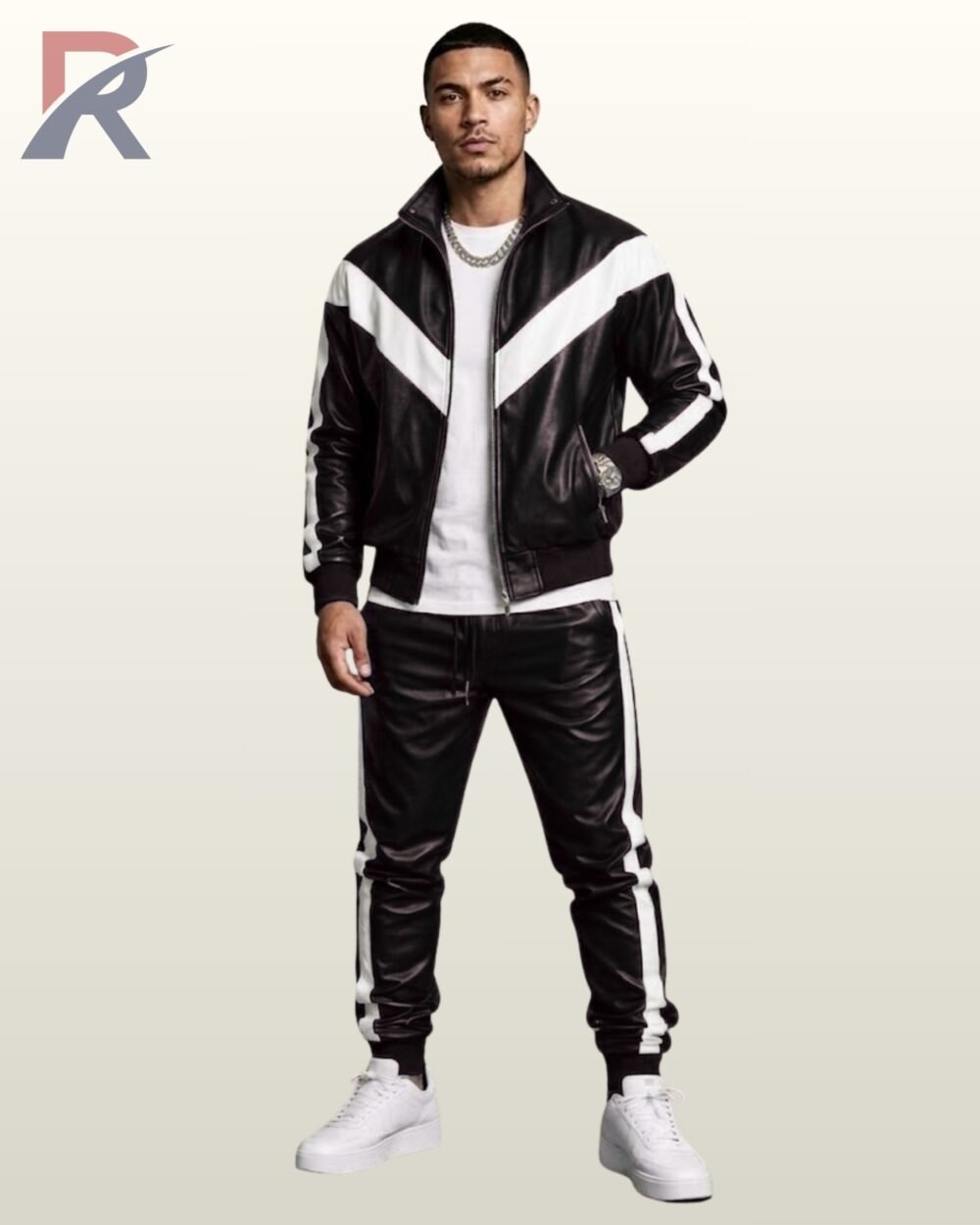 Classic black leather sports suit featuring a zip jacket and elastic cuffed track pants.