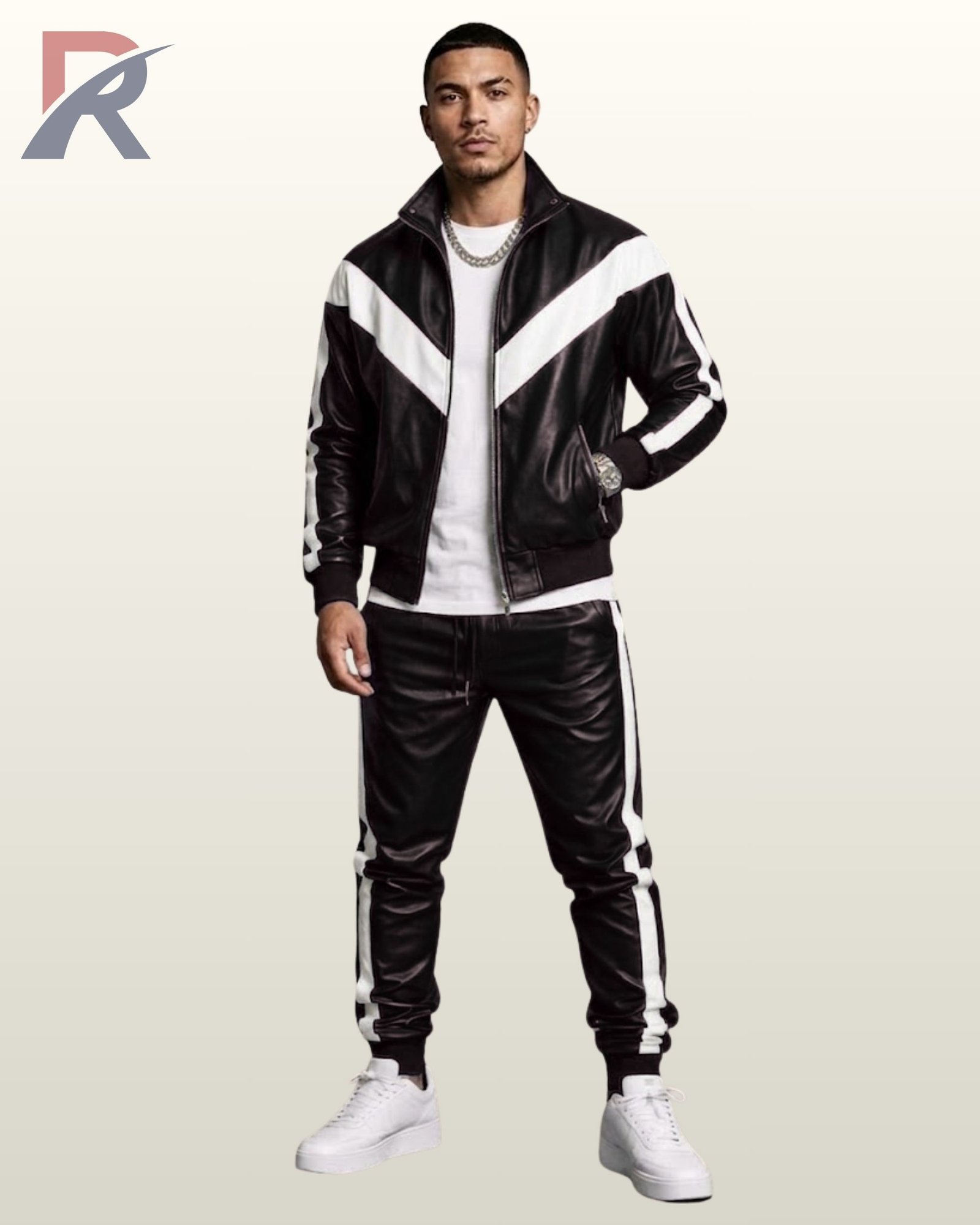 Classic black leather sports suit featuring a zip jacket and elastic cuffed track pants.