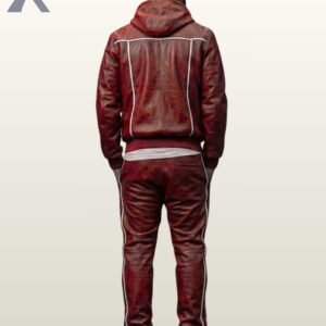 Streetwear styled red leather two-piece athletic suit with hoodie paired with white sneakers.