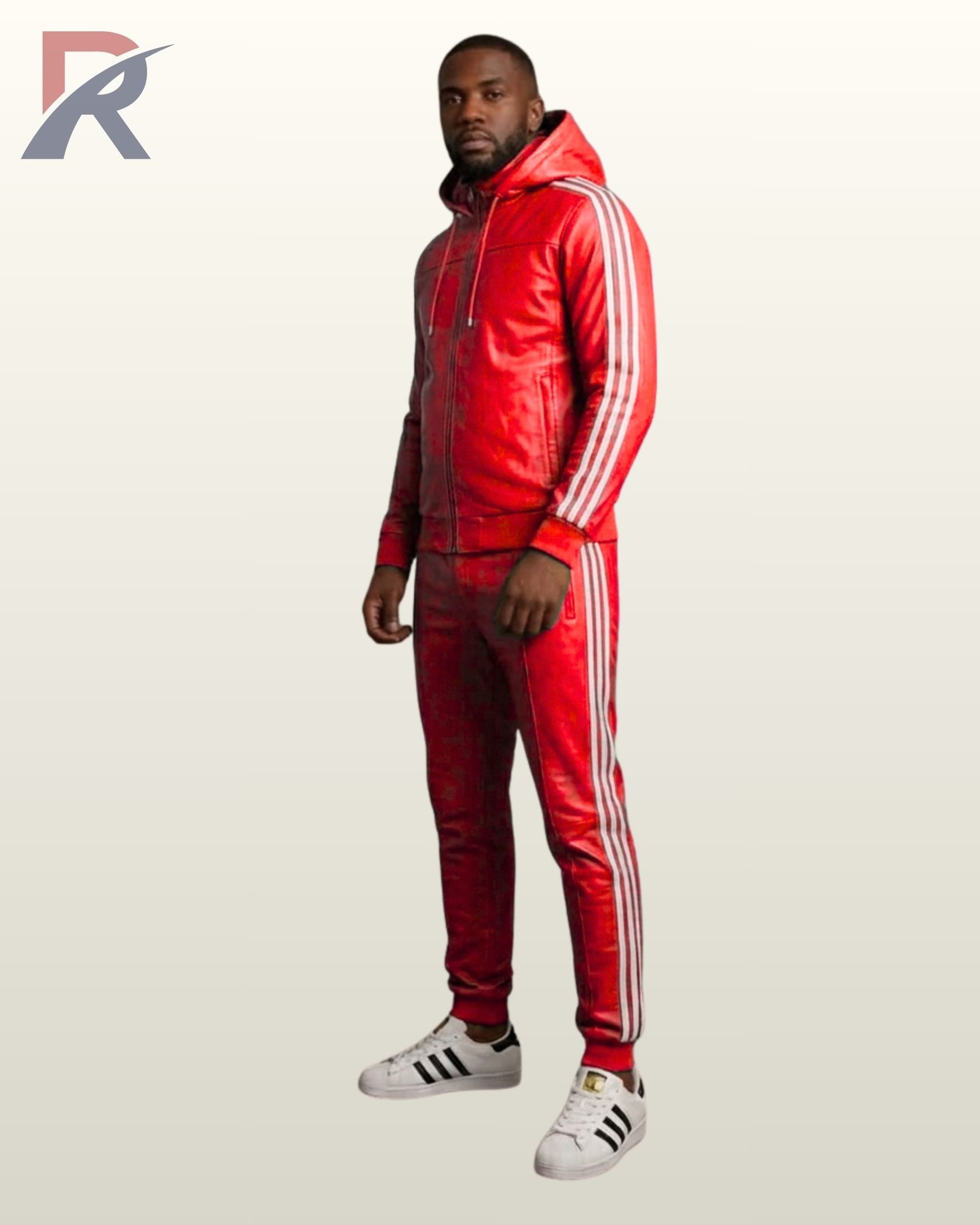 A full-length profile shot of a bright red leather track hoodie and matching pants.