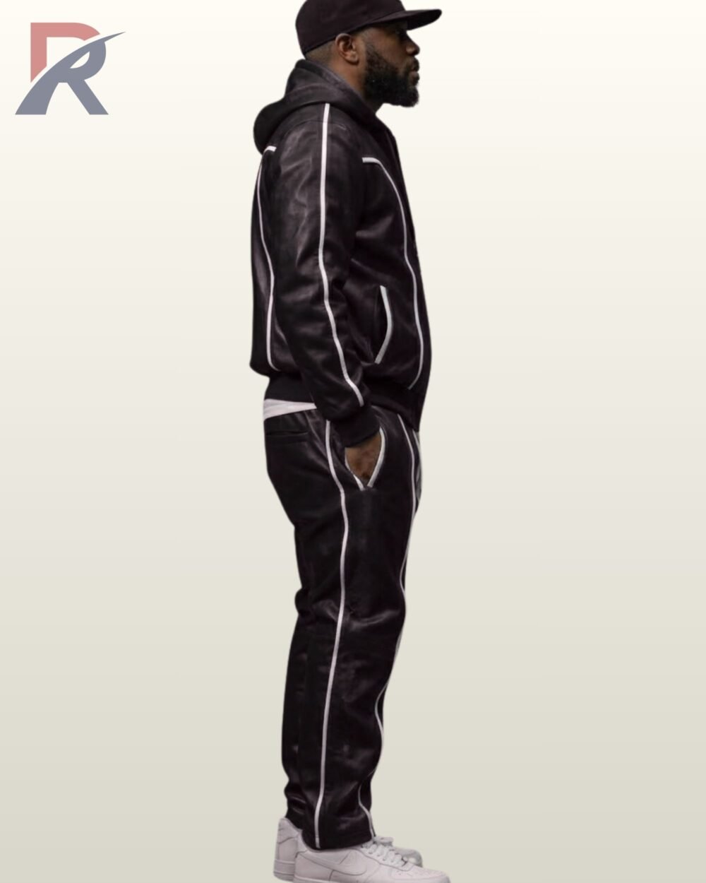 Full length view of men's black leather hooded jacket and pants set with white accent piping.Full length view of men's black leather hooded jacket and pants set with white accent piping.Full length view of men's black leather hooded jacket and pants set with white accent piping.Full length view of men's black leather hooded jacket and pants set with white accent piping.