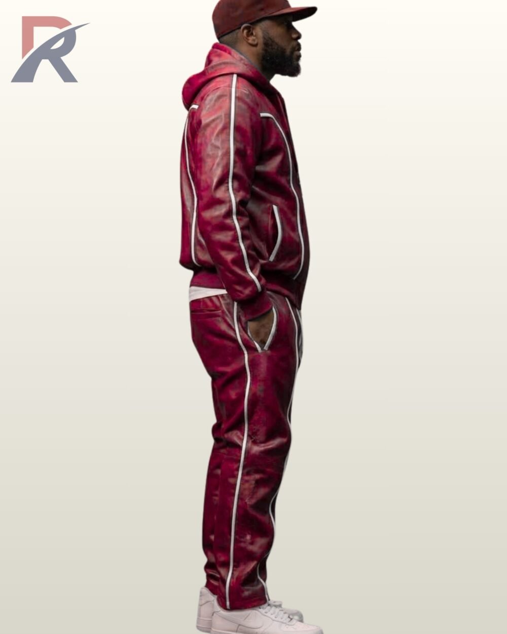 Men's red leather zip hoodie and matching trousers set with vertical white accent trim.