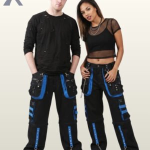 Man and woman modeling dark cyber goth wide-leg trousers styled with electric blue studded accents and metal D-ring hardware.