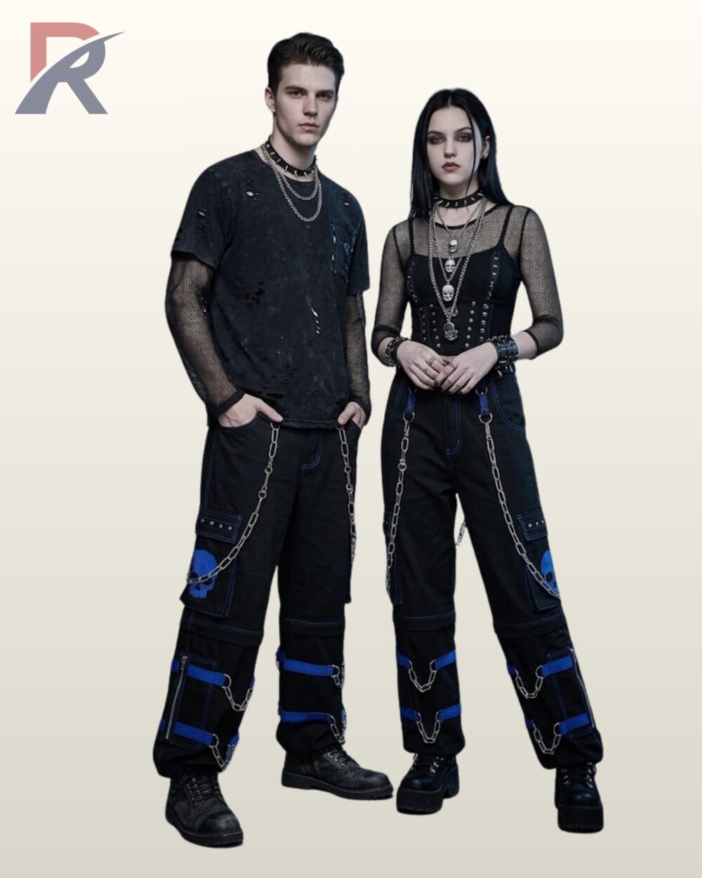 Full model view of a male and female wearing black gothic skull cargo pants with vibrant royal blue contrast stitching, blue skull pocket patch, and metal chains.