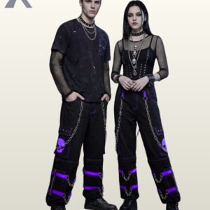 Full model view of a male and female wearing black gothic skull cargo pants with vivid purple contrast stitching, purple skull pocket graphic, and metal chains.
