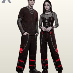 Full model view of a male and female wearing black gothic skull cargo pants with bold crimson red contrast stitching, red skull patch pockets, and metal chains.