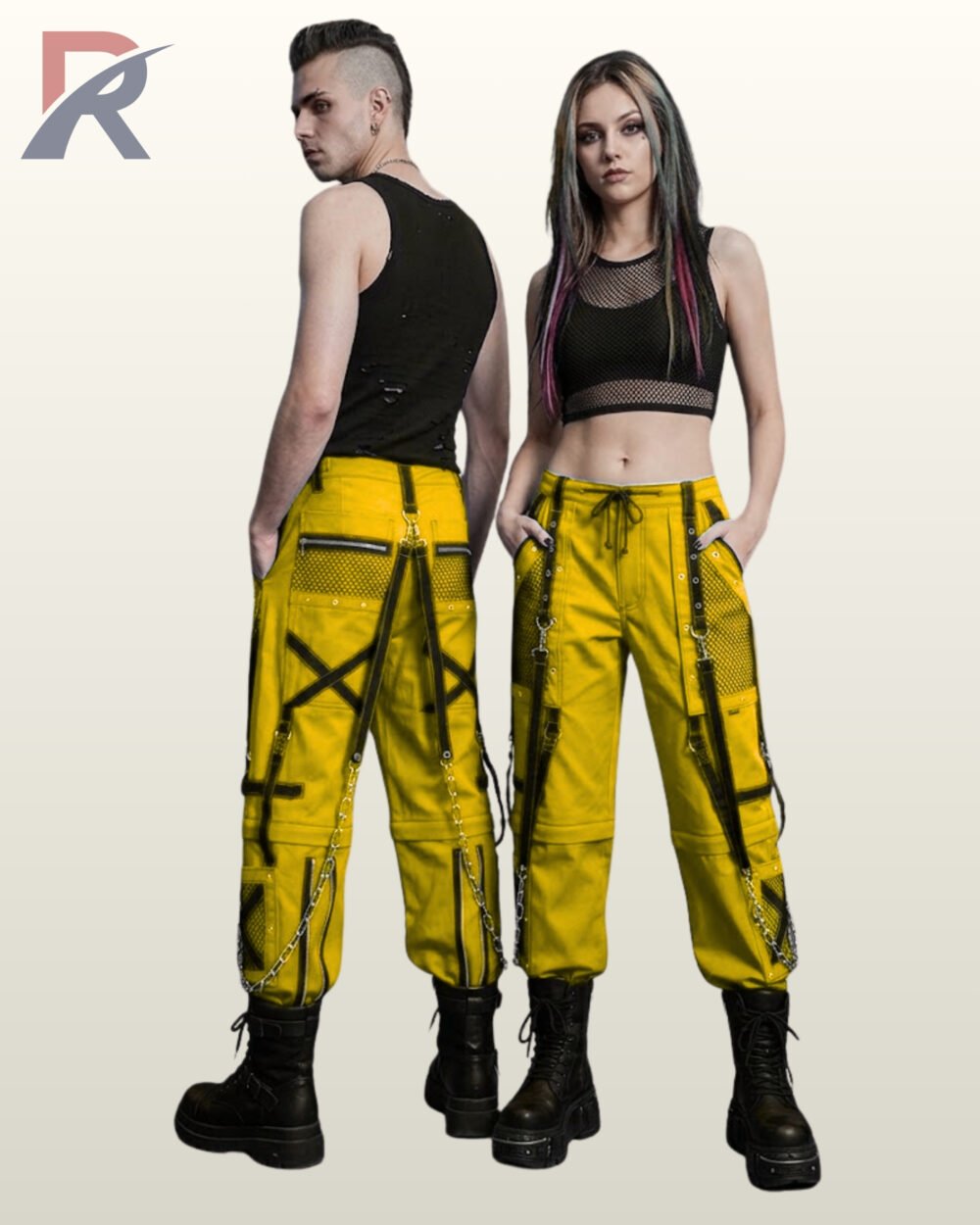Man and woman posing in yellow alternative cyber goth trousers featuring black hardware, mesh accents, and metal chain straps.
