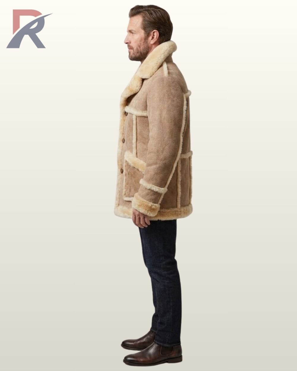 A close-up shot of a men's luxury tan sheepskin car coat featuring visible fur seams and button closures.