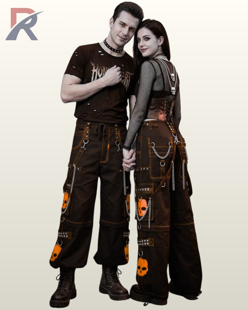 Black baggy gothic cargo pants featuring orange contrast stitching, skull patches, and metal chain hardware.