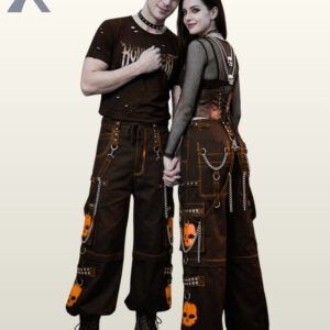 Black baggy gothic cargo pants featuring orange contrast stitching, skull patches, and metal chain hardware.