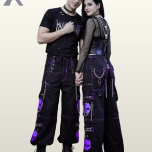 Man and woman wearing loose-fit black gothic cargo pants accented with purple contrast piping, skull motifs, and hanging chains.