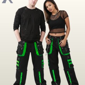 Man and woman modeling wide-leg cyber goth techwear pants featuring neon green studded details and silver chain hardware.