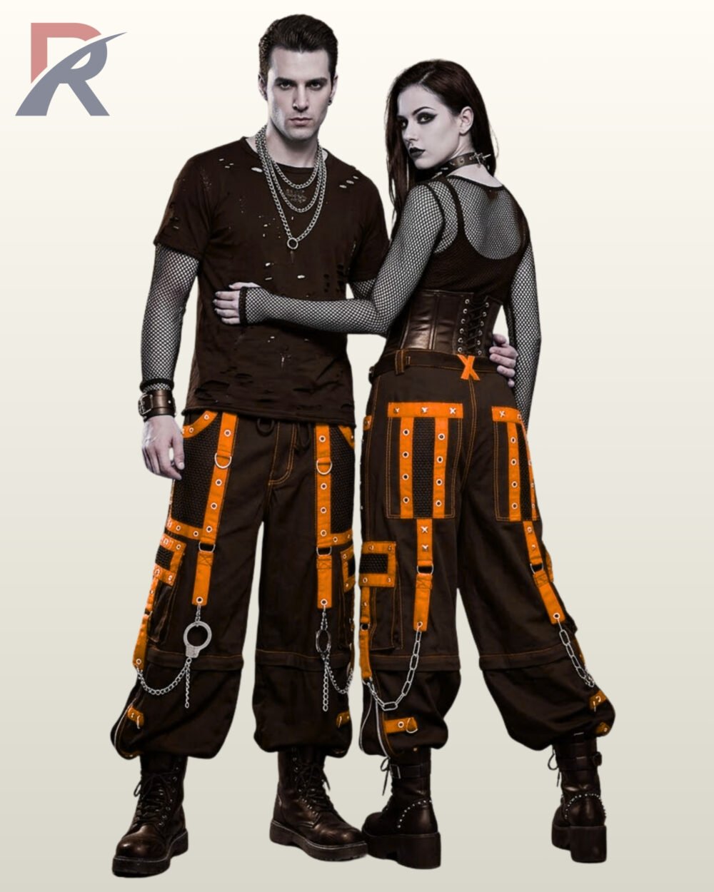 Front and back demonstration of baggy black punk cargo trousers with orange bondage straps.