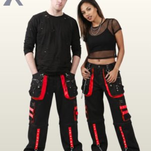 Front view of a man and woman wearing black gothic cargo pants accented with bright red trim, metal studs, and hanging chain hardware.