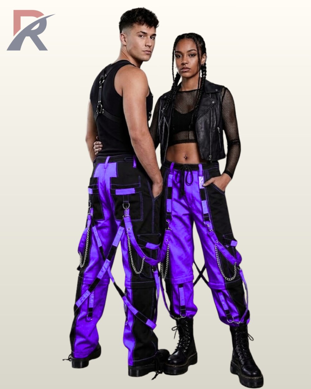 Couples catalog display of two-tone purple and black cyberpunk raver trousers featuring contrast purple stitching, hanging side chains, and platform boots.