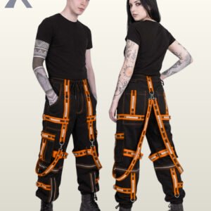 Man and woman modeling alternative cyber goth trousers featuring vivid orange reflective tape and silver metal hardware.