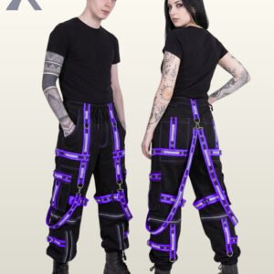 Man and woman posing in alternative darkwear trousers detailed with reflective purple bondage straps and silver metal hardware.