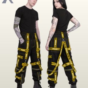 Man and woman posing in cyberpunk wide-fit trousers featuring bright yellow high-visibility reflective straps and metal rings.