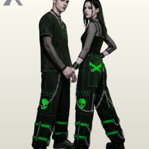 Couples catalog display of black cyberpunk cargo trousers featuring toxic neon green buckle leg straps, skull graphics, hanging silver chains, and platform boots.