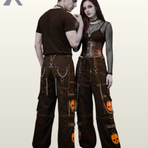 Couple wearing alternative streetwear trousers accented with orange skull prints and hanging metal chains.