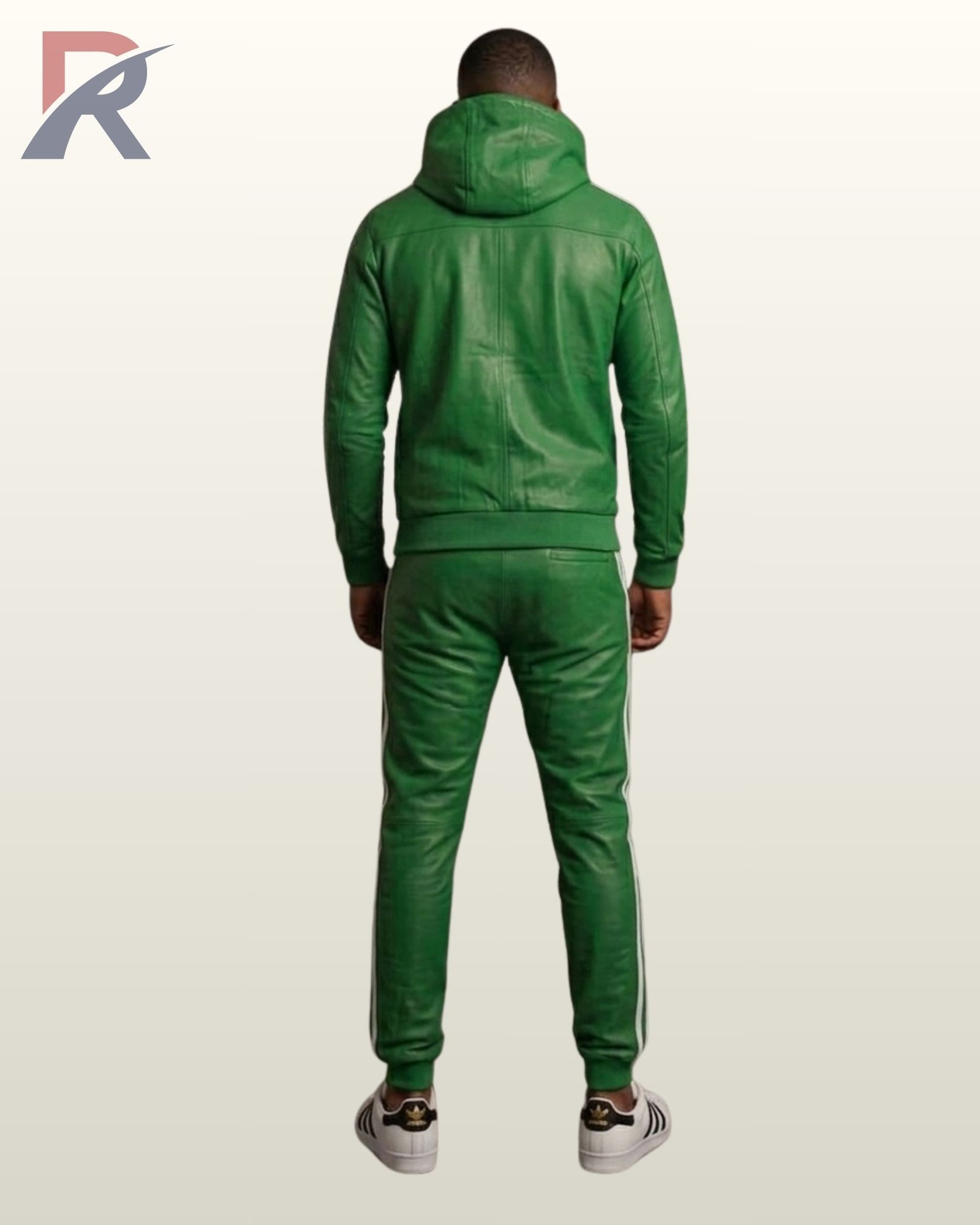A designer kelly green leather activewear set worn with white and black sneakers.