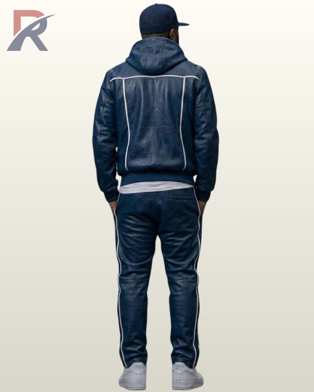 Streetwear styled blue leather hoodie and trousers set paired with white sneakers.