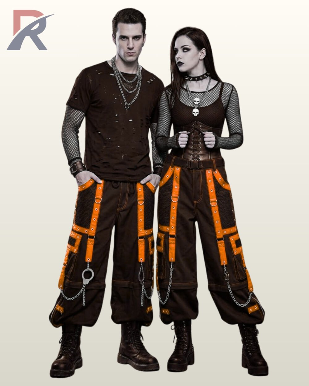 Wide leg black alt-fashion pants with bright orange strap accents and hanging metal hardware.